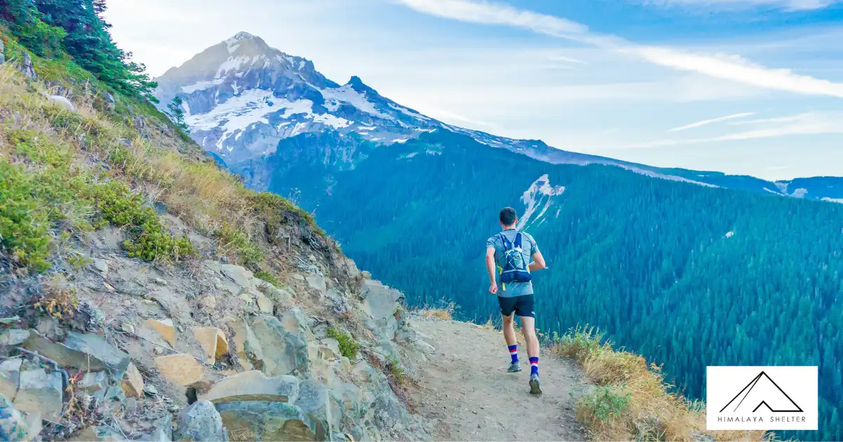 Man Running On A Trail In The Mountains
